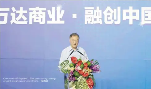  ?? — Reuters ?? Chairman of R&F Properties Li Silian speaks during a strategic cooperatio­n signing ceremony in Beijing.