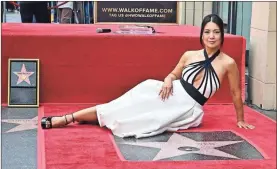  ?? Frederic J. Brown/aFP via Getty Images/Tns ?? Ming-Na Wen poses for a photo during her Hollywood Walk of Fame star unveiling ceremony in Los Angeles on May 30.