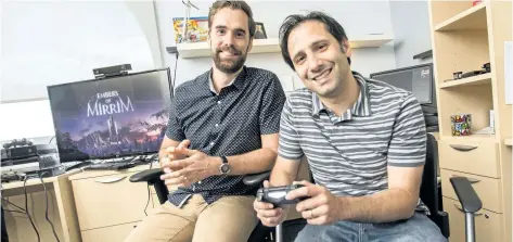  ?? BOB TYMCZYSZYN/STANDARD STAFF ?? Creative Bytes Studios’ Shawn Jackson, left, and Paul Caporicci have released a new video game called Embers of Mirrim.