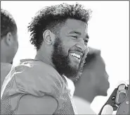  ?? NWA Democrat-Gazette/CHARLIE KAIJO ?? Arkansas Razorbacks wide receiver Jared Cornelius smiles during practice Saturday. Cornelius enters this year with the biggest career numbers among Arkansas wideouts with 79 receptions for 1,163 yards and 10 touchdowns, despite missing 15 games over...