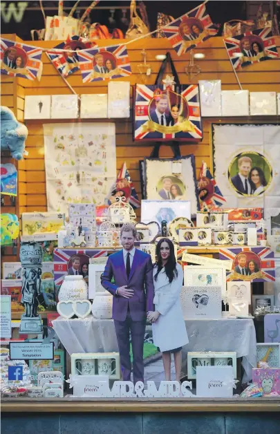  ??  ?? Souvenirs featuring Prince Harry and Meghan Markle are selling well in England, top, and left, the happy couple will marry at St George’s Chapel in Windsor on May 19