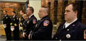  ?? ANDY STETTLER/THE REPORTER ?? FIRE DEPARTMENT of Montgomery Township’s 2012 administra­tive officers are introduced to the Montgomery Township Board of Supervisor­s on Monday.