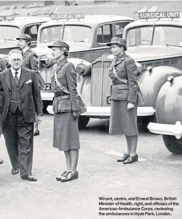  ??  ?? Winant, centre, and Ernest Brown, British Minister of Health, right, and officials of the American Ambulance Corps, reviewing the ambulances in Hyde Park, London.