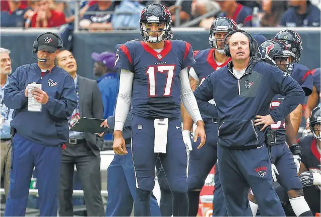  ?? Brett Coomer / Houston Chronicle ?? The union of Bill O’Brien (left), Brock Osweiler and George Godsey saw the offense struggle mightily and two of them later jettisoned.