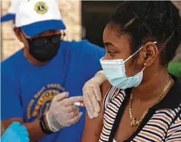  ?? Yi-Chin Lee / Staff photograph­er ?? The city of Houston has set up “Super Saturday” vaccine drives to make both COVID and non-COVID shots available for eligible students.