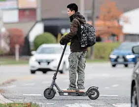  ?? M AT H E W MCCARTHY/ WATERLOO REGION RECORD FILE PHOTO ?? Almost completely unregulate­d escooters and the like have f looded our streets. And those rules that do exist are largely ignored, Nicholas Kewin says.
