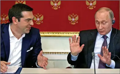  ??  ?? Discussion­s: Greek Prime Minister Alexis Tsipras and Russian President Vladimir Putin in April