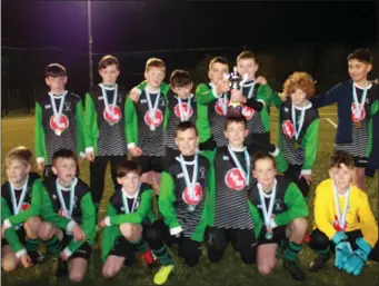  ??  ?? Albion Rovers White celebrate their victory over Duleek in the Under-12 Cup Final.