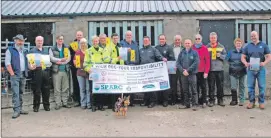  ?? 06_a26NFUSdog­attacks01 ?? Mid Argyll farmers and NFUS members, union officials, police, vets and Argyll and Bute Council staff in 2019 with the ‘Your Dog – Your Responsibi­lity’ campaign.