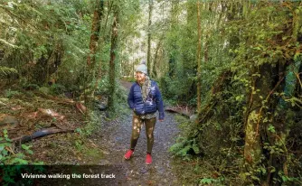  ??  ?? Vivienne walking the forest track