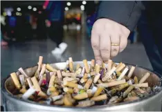  ?? — AFP ?? Cigarette butts and other tobacco waste are the largest source of individual pieces of litter across the globe, according to the World Health Organizati­on.