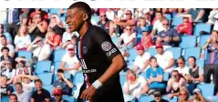  ??  ?? Crowd pleaser: Mbappe enjoys his goal in front of fans