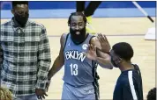  ?? MARK MULLIGAN — HOUSTON CHRONICLE VIA AP ?? Brooklyn Nets guard James Harden (13) celebrates as he leaves the game during the game against the Houston Rockets Wednesday, in Houston.