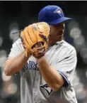  ?? STACY REVERE/GETTY IMAGES ?? Joe Biagini got the start for the Jays, and chipped in at the plate, in Tuesday night’s victory over the Brewers.