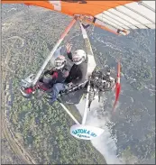  ??  ?? Peter Bailey over Victoria Falls on his 80th