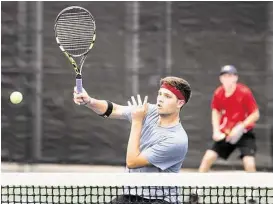  ?? Brett Coomer / Houston Chronicle ?? Memorial’s Sammy Giammalva, front, and teammate Max Palmer won the UIL Class 6A boys doubles tennis championsh­ip.