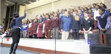  ?? Pictures: Lisa Penderis Photograph­y ?? SMALL BODIES, BIG VOICES: Pupils from 21 Stellenbos­ch and Franschhoe­k primary schools gathered on Saturday in the Coetzenbur­g Centre to celebrate the Madiba centenary.