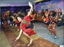  ??  ?? As part of the event, students enjoyed entertainm­ent from local African dance groups and musicians, ahead of viewing “Black Panther,” which smashed several opening weekend box-office records. The students packed buses and received a police escort there.