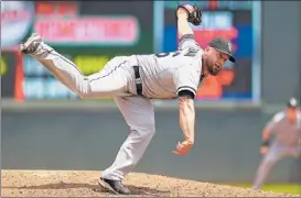  ?? | AP ?? Jesse Crain (2-1, 0.53 ERA) wriggled out of a sticky situation in the eighth to extend his team record of consecutiv­e scoreless appearance­s to 29.