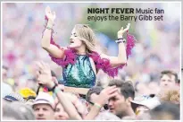  ??  ?? NIGHT FEVER Music fan enjoys the Barry Gibb set
