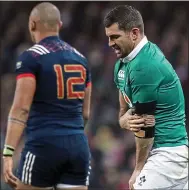  ??  ?? PAIN: Rob Kearney was in the wars against the French