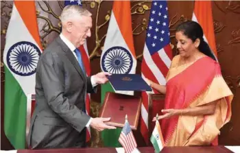  ?? PHOTOGRAPH: PIB ?? US Secretary of Defence James Mattis and Defence Minister Nirmala Sitharaman exchanging the documents after signing the COMCASA during the 2+2 Bilateral Dialogue between the two countries in New Delhi