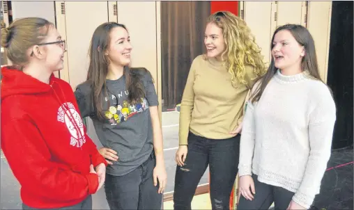  ?? SALLY COLE/THE GUARDIAN ?? Cast members appear in a rehearsal scene from Charlottet­own Rural High School’s production of “High School Musical”. From left are Brett MacLeod, Olivia MacPhee, Riley McGill and EmmaJane Webster-Lawrence. The show plays May 10-12 in the Homburg...