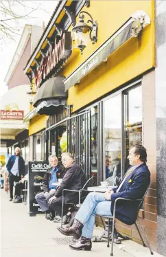  ?? Tourism Vancouver/ Nelson Mouellic ?? Above: A long-standing Commercial Drive neighbourh­ood café.