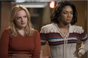  ?? WARNER BROS. PICTURES ?? Elisabeth Moss, left, and Tiffany Haddish share a scene a scene from “The Kitchen.”