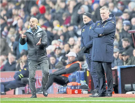  ??  ?? Manchester City manager Pep Guardiola, left, and Aston Villa boss Dean Smith, right, during a Premier League match in January.