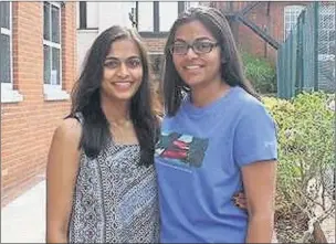  ??  ?? ALL SMILES: Pupils from Northwood School proudl display their grades and left, a shocked Disha Haria achieved a stunning collection of A* results