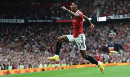  ?? ?? Marcus Rashford celebrates after scoring one of his two goals in the victory against Arsenal on Sunday. Photograph: Peter Powell/EPA