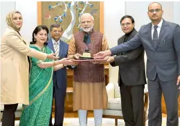  ?? — PTI ?? Prime Minister Narendra Modi receives the first-ever Philip Kotler Presidenti­al award, in New Delhi, on Monday.