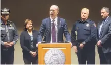  ?? MARLA BROSE/JOURNAL ?? From left, State Police Chief Pete Kassetas, Gov. Susana Martinez, Albuquerqu­e Mayor Richard Berry, Albuquerqu­e Police Chief Gorden Eden and Paul Pacheco, deputy secretary for the state Department of Correction­s, were among a group announcing the...