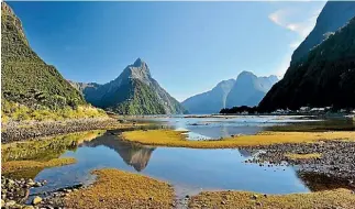  ?? PHOTO: 123RF ?? Milford Sound is a photograph­er’s dream with the majestic Mitre Peak.