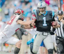  ?? BOB LEVERONE/THE ASSOCIATED PRESS/FILES ?? Carolina Panthers QB Cam Newton has a chance to pull off a rare feat for the second time in his career — lead his team in rushing for the season. Newton first did it in 2012.