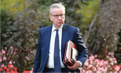  ?? Photograph: Justin Tallis/AFP/Getty Images ?? Michael Gove arrives for a cabinet meeting at the Foreign Office on Tuesday after announcing the change in government advice on home working.