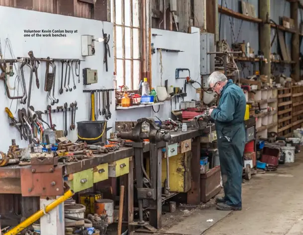  ??  ?? Volunteer Kevin Conlan busy at one of the work benches