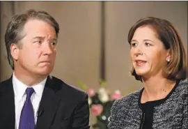  ?? Jacquelyn Martin Associated Press ?? BRETT KAVANAUGH and his wife, Ashley Estes Kavanaugh, sat for an interview with Fox News on Monday. A phrase he used repeatedly: “fair process.”