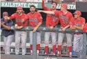  ?? JIM LYTLE/AP ?? Arizona players react to an out during Friday’s super regional game in Starkville, Miss.