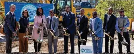  ?? Leaders. RILEY BUNCH/RILEY.BUNCH@AJC.COM ?? Atlanta Mayor Andre Dickens (center) celebrates Monday’s groundbrea­king on a section of Beltline Southside Trail with project and community