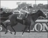  ??  ?? Hugh Bowman and CHEVAL BLACK (JPN) head to the line to win the 2017 renewal of the Grade 1 Japan Cup (2400m) at Tokyo on Sunday.
Picture: Japan Racing Associatio­n