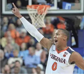  ?? BRAD PENNER/USA TODAY SPORTS ?? Virginia’s Devon Hall and the Cavaliers are the No. 1 seed in the South Region.