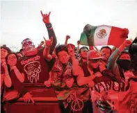  ?? Rebecca Blackwell / AP ?? El público celebra a la banda Brujería en el festival Vive Latino en la Ciudad de México el domingo 19 de marzo.