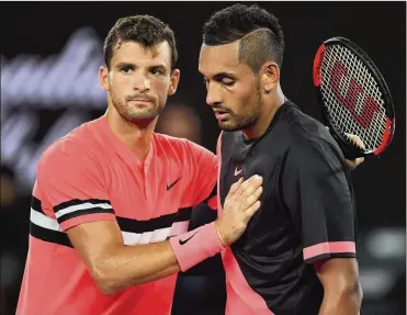  ?? ANDY BROWNBILL / ASSOCIATED PRESS ?? Bulgaria’s Grigor Dimitrov (left) is congratula­ted by Australia’s Nick Kyrgios after winning their fourth-round match at the Australian Open on Sunday. Dimitrov is pursuing the first major victory of his career.