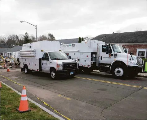  ?? H John Voorhees III / Hearst Connecticu­t Media ?? Last week, Eversource closed Prospect Street between Main and Grove streets in Ridgefield to remove poles and take lines and equipment and bury them undergroun­d. When completed, the effort is expected to reduce the frequency of outages.