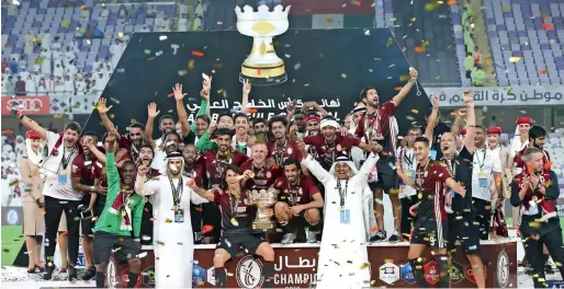  ?? Photo by Ryan Lim ?? Al Wahda players celebrate after winning the Arabian Gulf Cup final at the Hazza bin Zayed Stadium in Al Ain. —