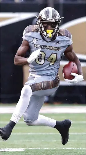  ??  ?? Western Michigan wide receiver Corey Davis, who attended Wheaton Warrenvill­e South, didn’t run at the NFL Scouting Combine or his pro day after surgery on his ankle.
| AP