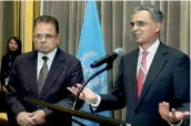  ?? — AP ?? India’s permanent representa­tive to the UN Syed Akbaruddin speaks during a reception in the honour of Dalveer Bhandari ( left) in New York on Monday.