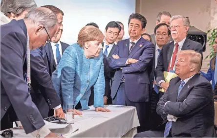  ??  ?? President Donald Trump listens to leaders from other G-7 countries Saturday during the summit’s second day.